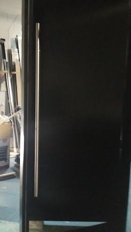 Fiberglass Door-Modern Door-Modern Solid Door with stainless steel handle during manufacturing